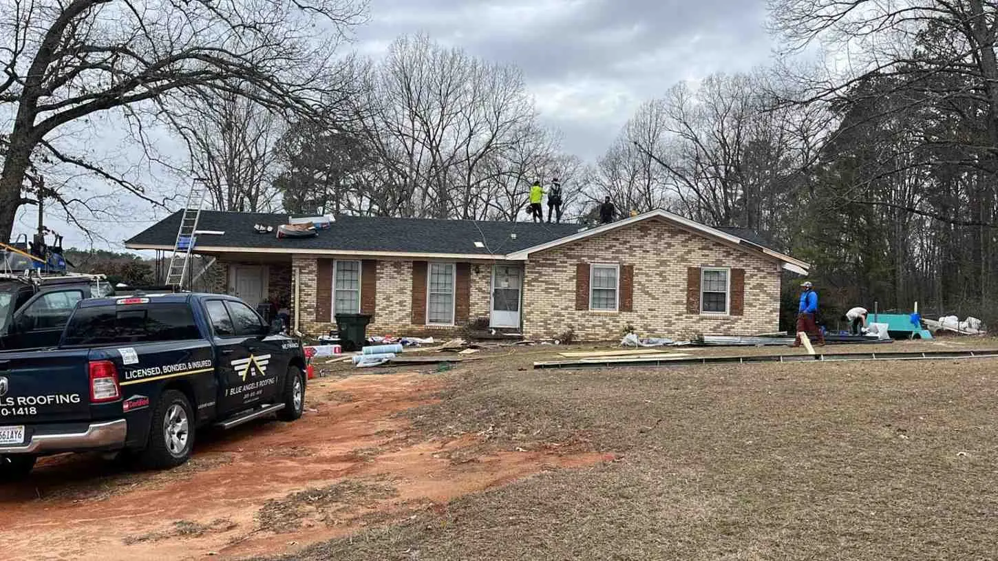 Blue Angels Roofing team performing commercial roof tune-up in Alabama and Georgia to prevent leaks, extend roof life, and maintain energy efficiency.