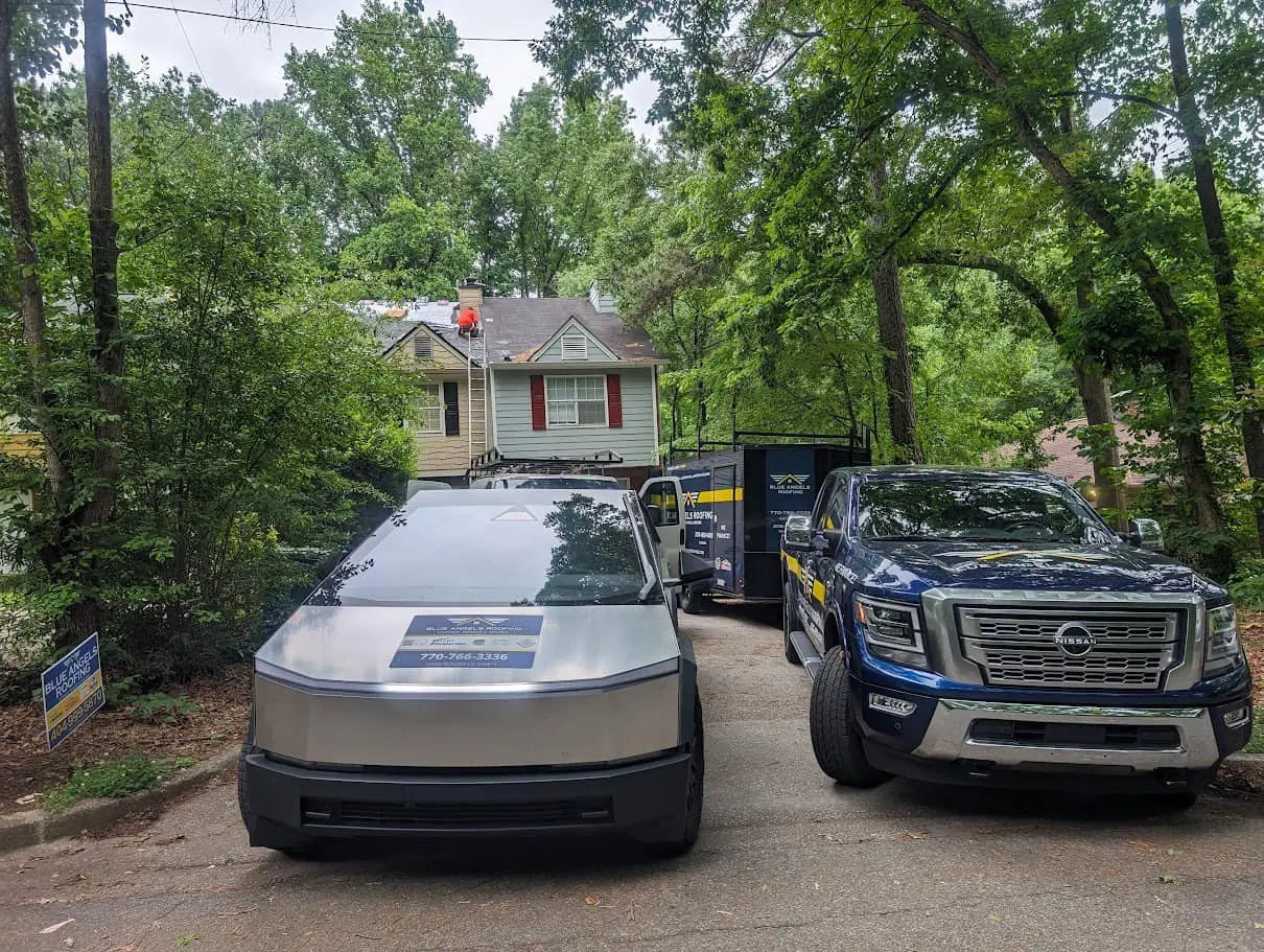 Blue Angels Roofing team applying commercial roof coatings in Alabama and Georgia to enhance durability, reduce energy costs, and extend roof life.