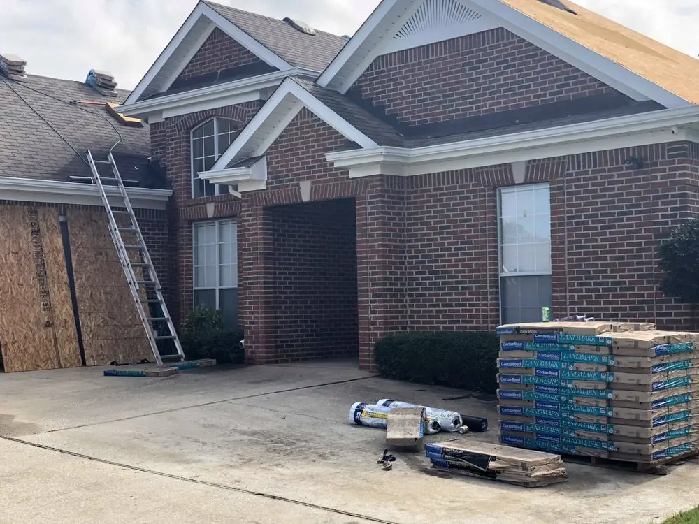 Blue Angels Roofing team installing high-quality gutter guards in Alabama and Georgia to protect homes and commercial properties from debris and water damage.