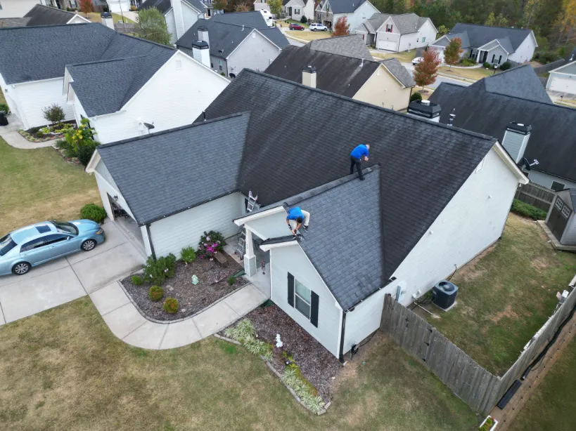 Blue Angels Roofing team installing high-quality gutters in Alabama and Georgia to protect homes and commercial properties from water damage.